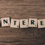 Online Communities - Pinterest Scarbble on Brown Wood