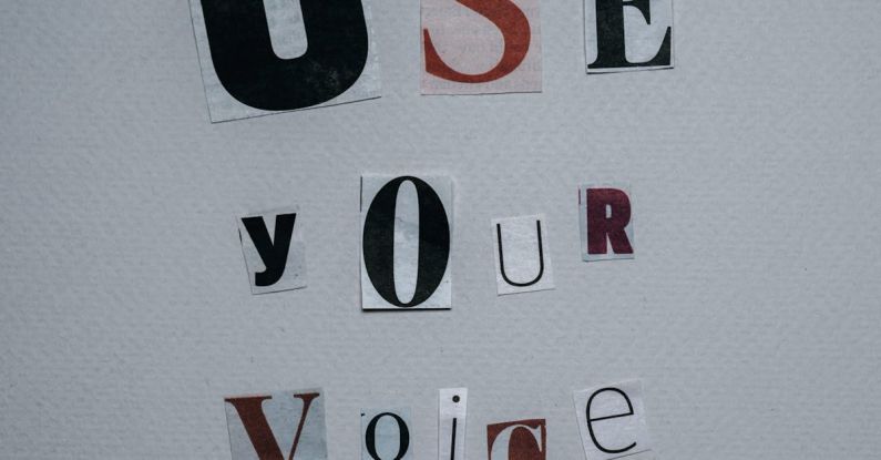 Cashless Society - Use Your Voice inscription on gray background