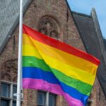 Social Movements - Pride Flag of LGBT and Its Social Movements in Front of an old Building