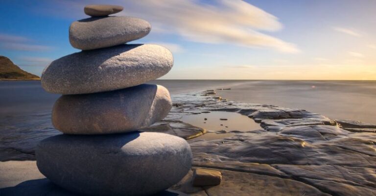 Mindfulness And Meditation - Stacked of Stones Outdoors
